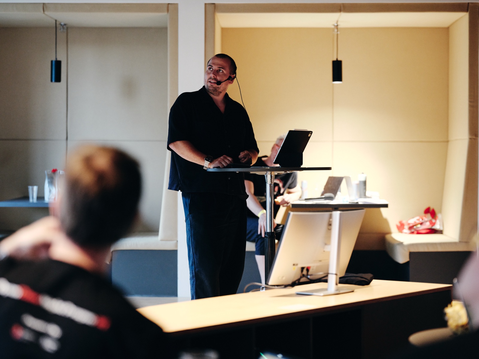 Speaker presenting an agent demo
