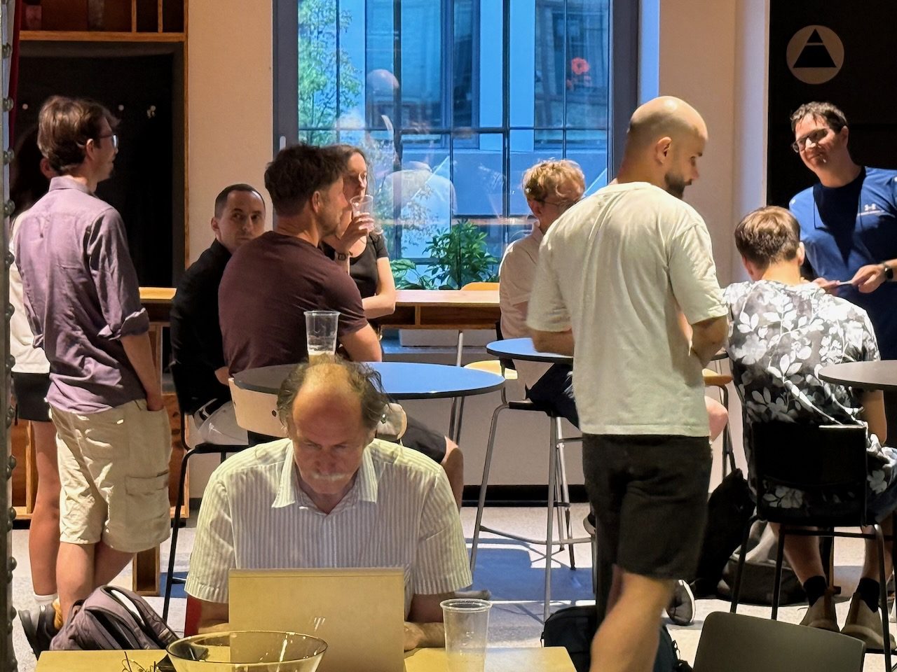 Hands-on microhackathon, builders working around a table